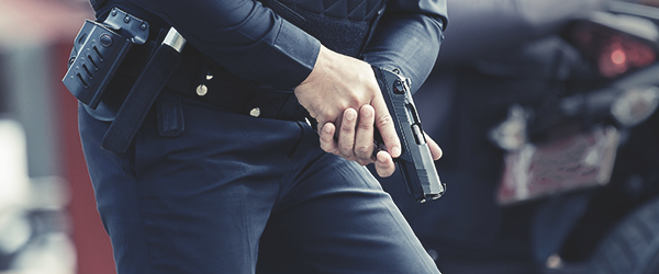 law-enforcement-officer-drawing-weapon-email-box-600x250